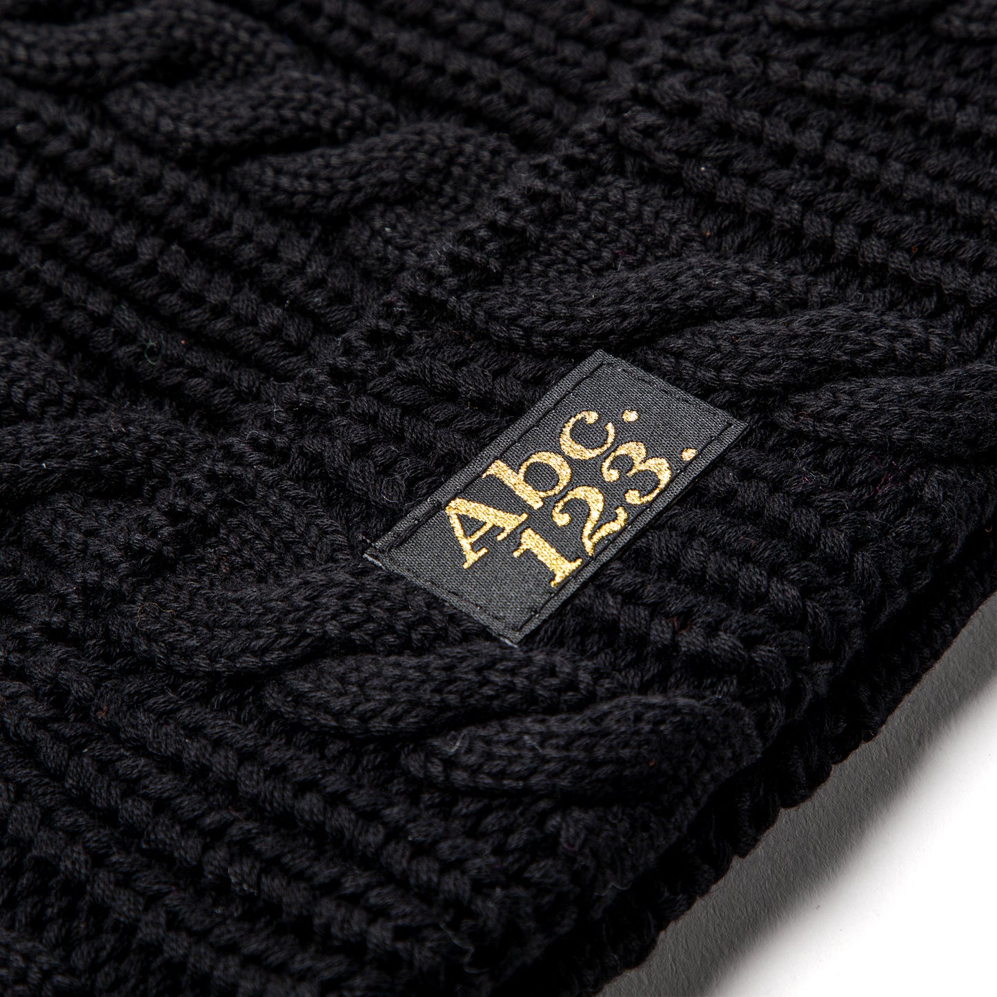 Advisory Board Crystals Abc. 123. Cableknit Beanie (Anthracite Black)