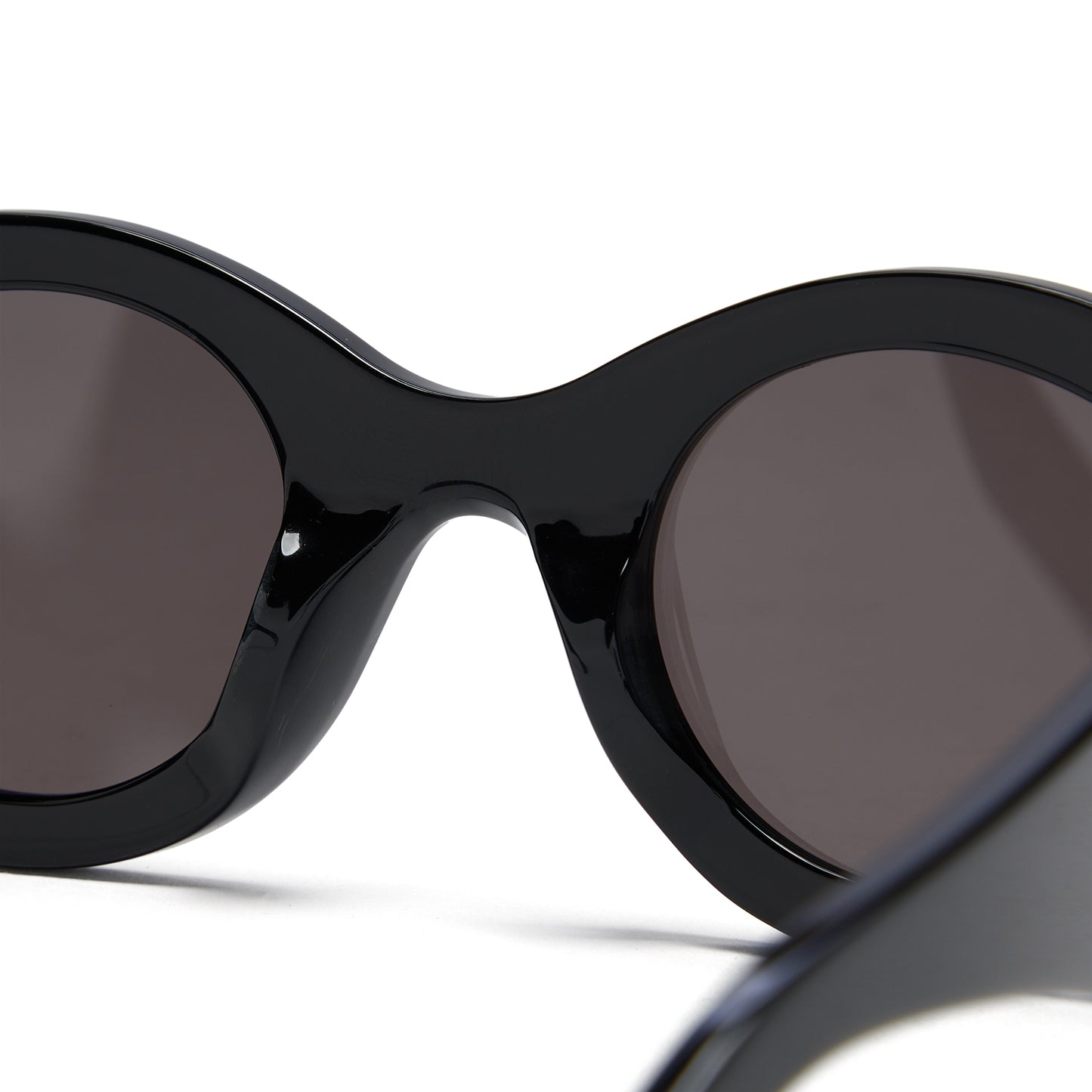 Alaia Elongated Acetate Round Sunglasses (Black/Grey)
