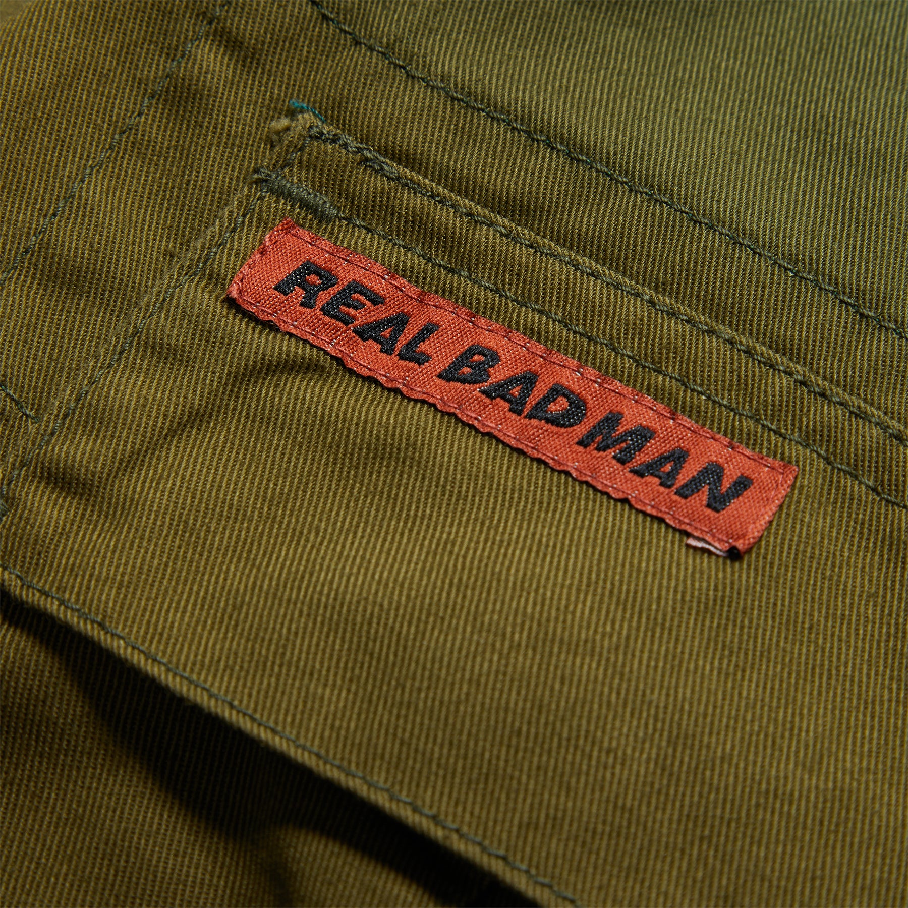 Real Bad Man x Gramicci 1 Pocket G Pants in Army