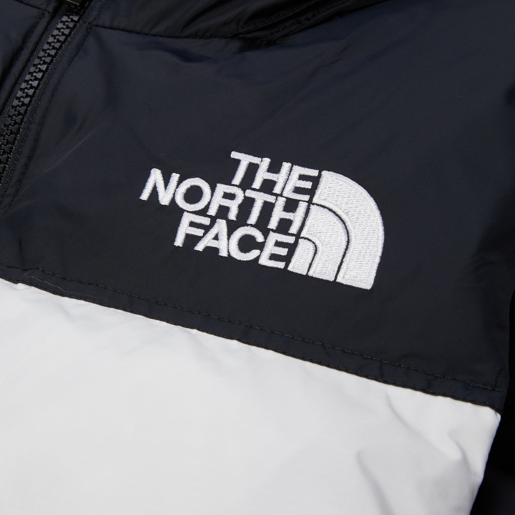 The North Face 1996 Retro Nuptse Vest (TNF White/TNF Black) – Concepts