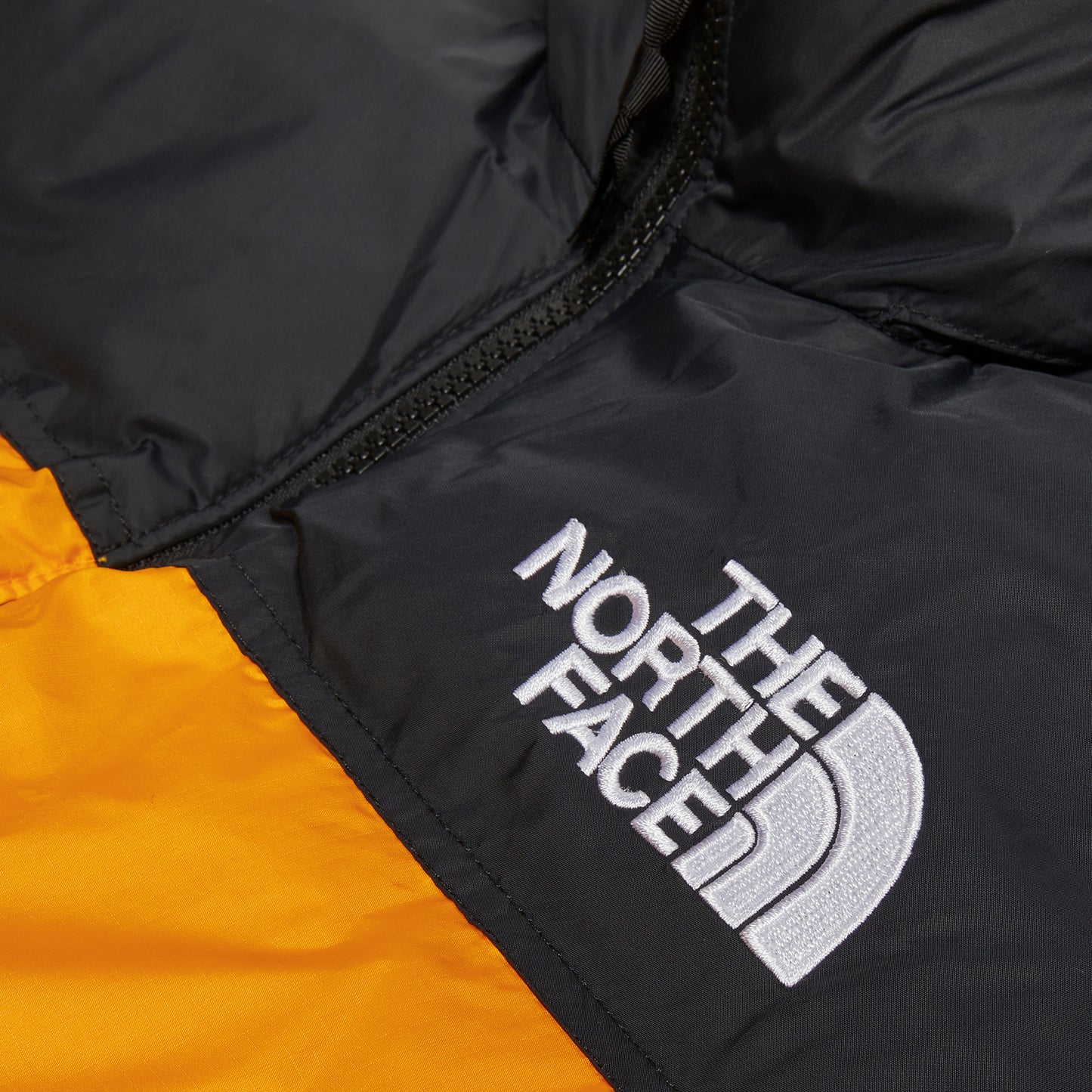 The North Face 1996 Retro Nuptse Vest (Summit Gold/TNF Black) – CNCPTS