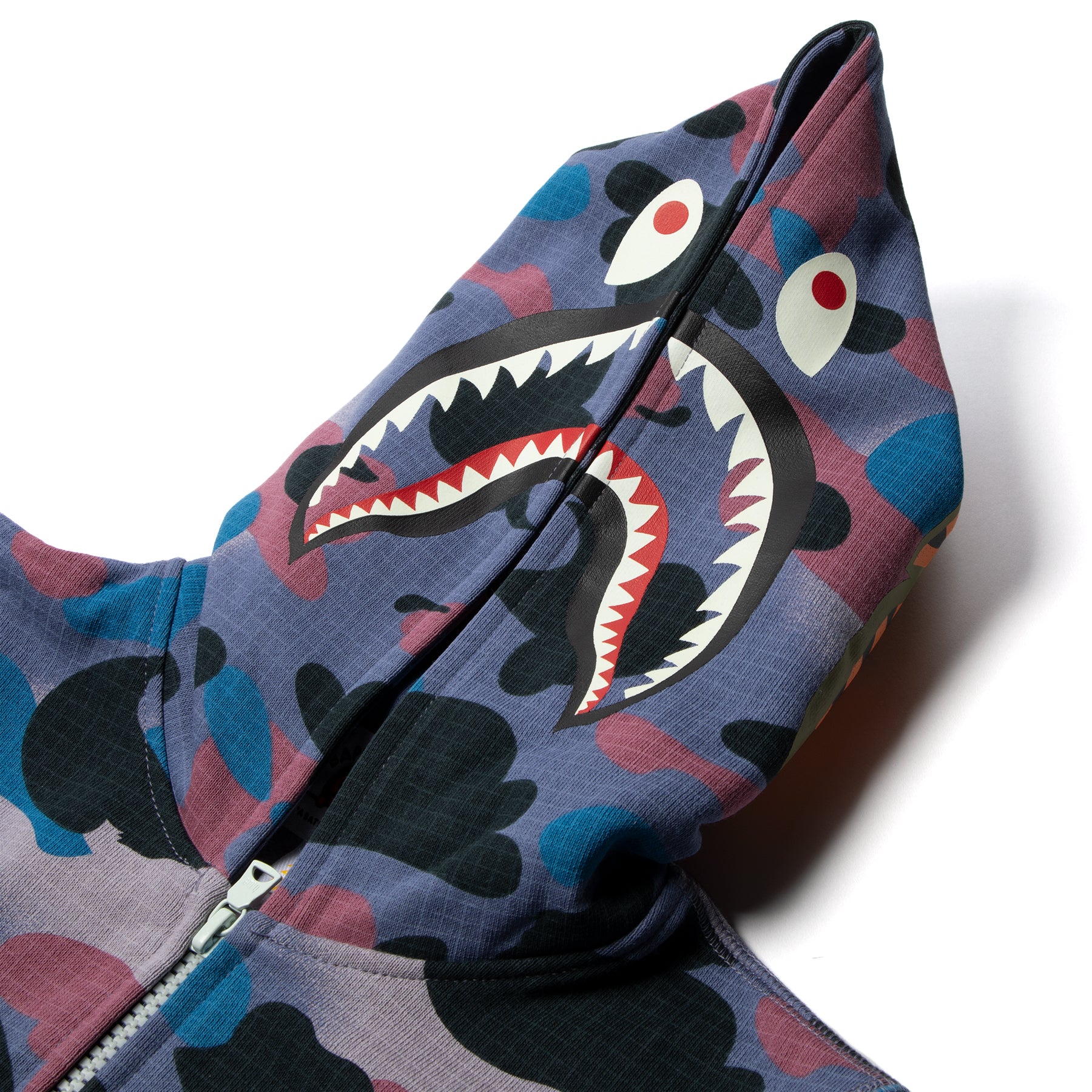 dababy wearing 🧥Palm Angels Printed Logo Tartan Shirt ($840) 👕Bape Neon  Shark Full Zip Hoodie ($450) 🩳Bape × Champion Sweatshorts…